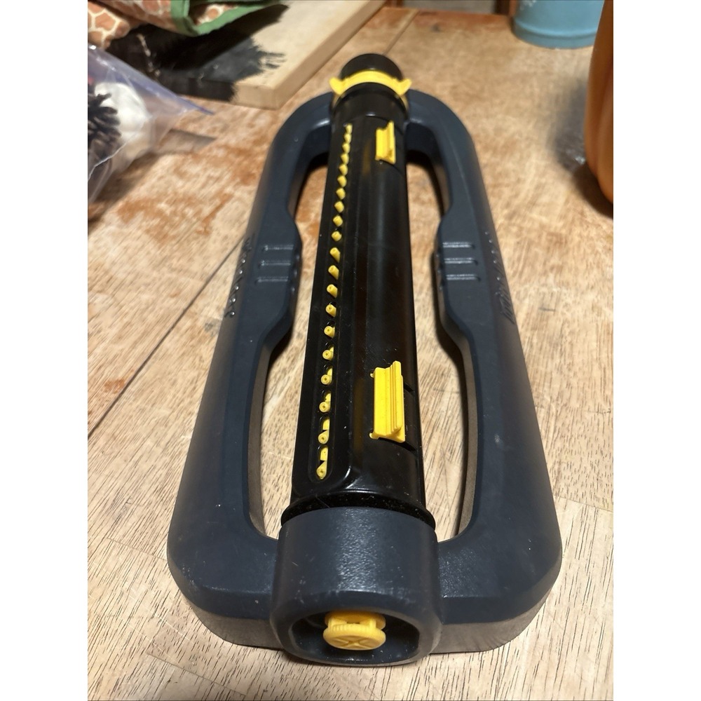 Melnor Oscillating Sprinkler Black Yellow Plastic Lawn Garden Irrigation Tool